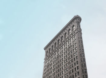 Low angle view of modern building against clear sky