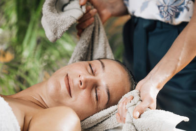 Midsection of woman lying down