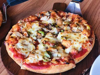 High angle view of pizza on table