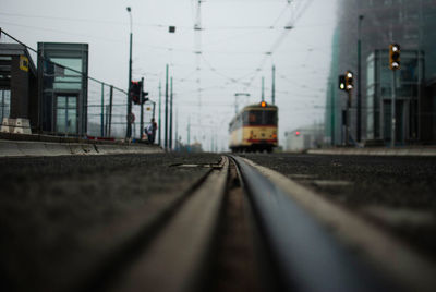 Train on railroad track at city