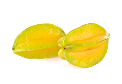 Close-up of fruits against white background