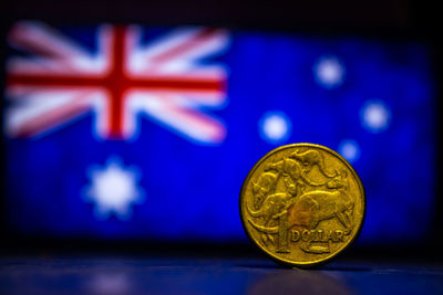 Close-up of coins against blue background