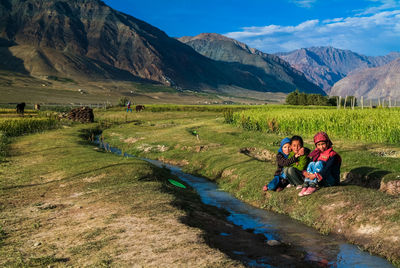 People on mountain road