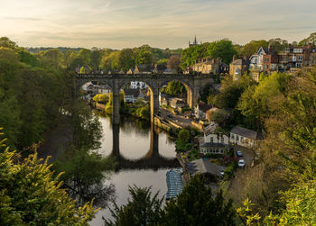 Bridge over river against sky