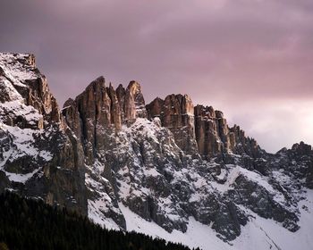 Scenic view of mountains against sky during winter