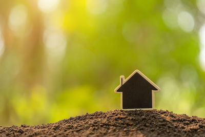 Close-up of small hut on land