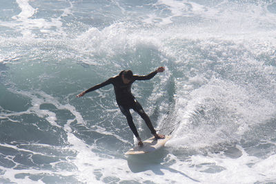 Man surfing in sea