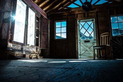 Abandoned building seen through broken window