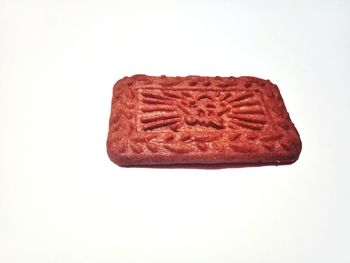 Close-up of chocolate cake against white background