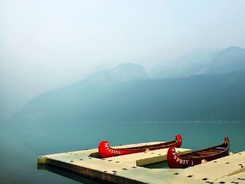 Scenic view of mountains against sky during foggy weather