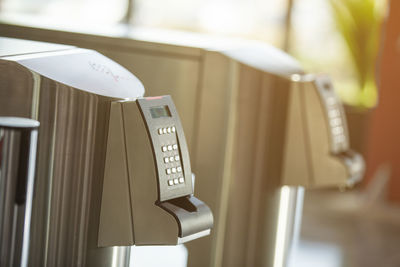 Close-up of telephone booth on table