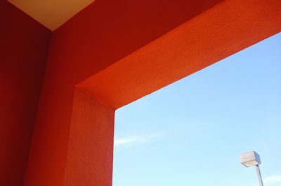 Low angle view of building against clear blue sky