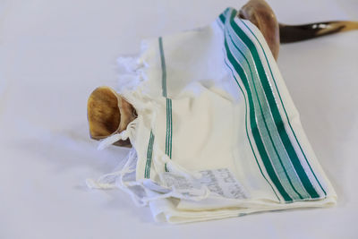 Close-up of cake on white table