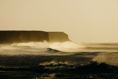 Scenic view of rough sea during sunset in fuerteventura