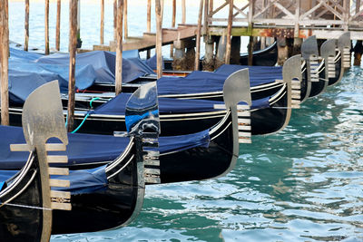 Boats moored in canal