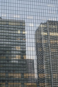 Low angle view of modern buildings in city