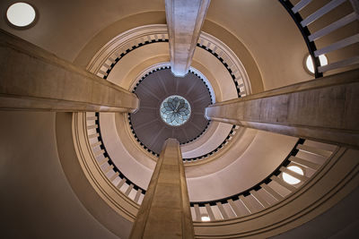 Low angle view of spiral staircase in building