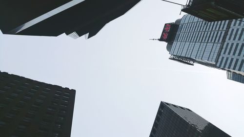 Low angle view of buildings against clear sky