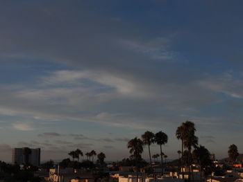 Panoramic view of buildings against sky during sunset