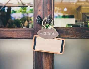 Close-up of text on wooden table