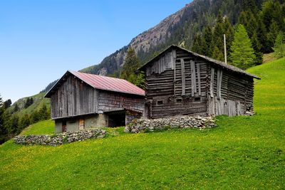 House on field against sky