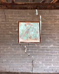 Low angle view of window on wall
