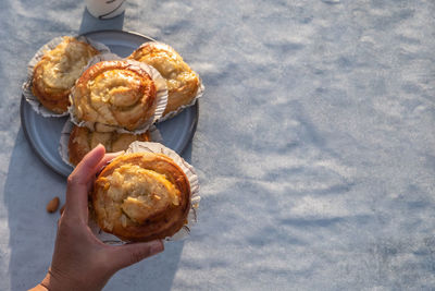 High angle view of person holding ice cream