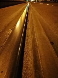 High angle view of railroad tracks at night