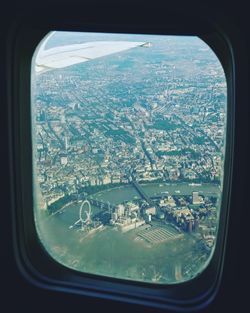 Aerial view of sea seen through airplane window