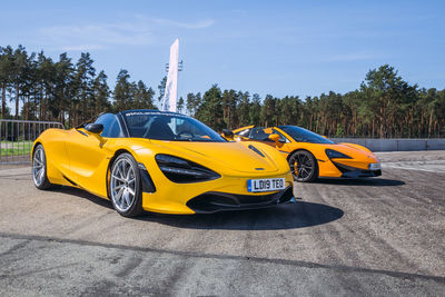 Yellow car on road