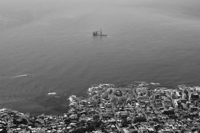 High angle view of cityscape by sea