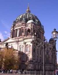 Low angle view of church against blue sky