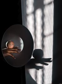 Boy standing by window