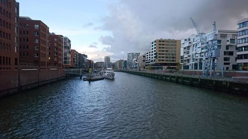 View of river passing through city