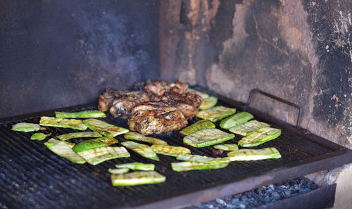 Close-up of meat on barbecue grill