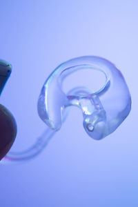 Close-up of bubbles against blue background