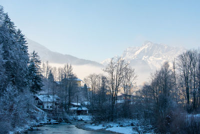 Scenic view of snowcapped mountains against clear sky