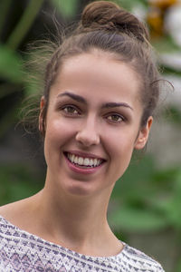 Portrait of smiling young woman