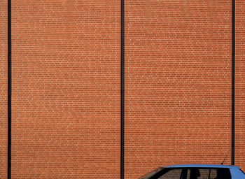 Cropped image of car against wall