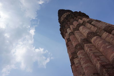 Low angle view of historical building against cloudy sky