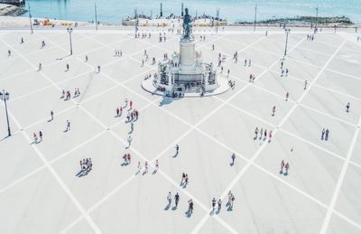 High angle view of people near statue at praca do comercio