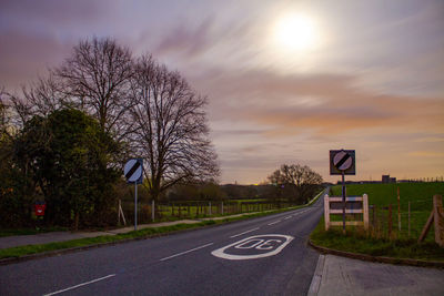 Empty road against sky
