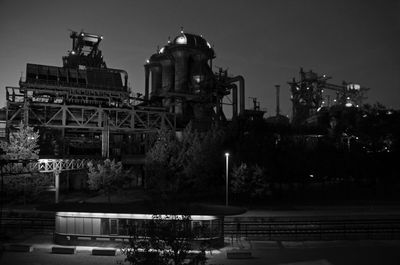 View of factory against sky at night