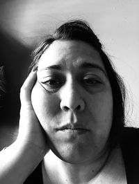 Close-up portrait of a smiling young woman