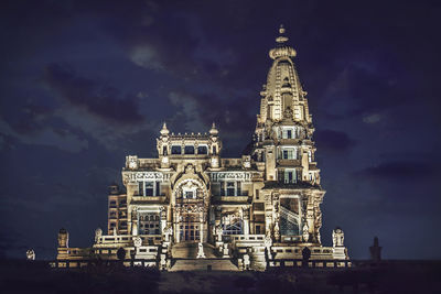 Low angle view of building against sky at night