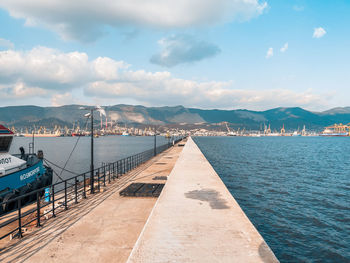 Pier over sea against sky