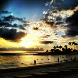 Scenic view of sea against cloudy sky