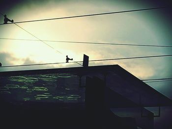 Low angle view of power lines