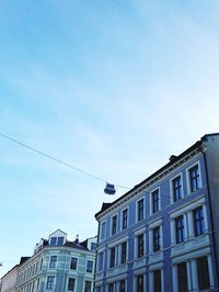 Low angle view of building against blue sky