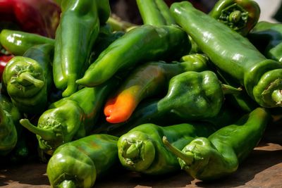 Close-up of green chili peppers in market
